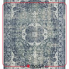 a blue and white area rug with an ornate design on the bottom half of it