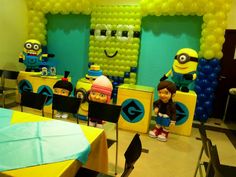 the birthday party is decorated with minion balloons and decorations for children's birthdays