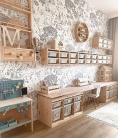 a room filled with lots of wooden furniture and wallpaper covered in floral designs on the walls