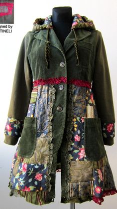 a green jacket with floral designs on it