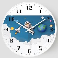 a clock with an astronaut and planets on it