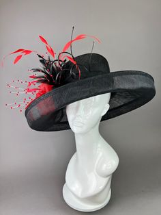 Black Hat base adorned with red center decor, curled ostrich spines and cut feathers. Fits crown size of 22.5" with internal elastic band to create a snug and comfortable fit for crown sizes smaller than 22.5". Please measure prior to purchasing as all sales are final. Don't forget to follow us on Instagram! Black High Crown Top Hat For Races, Black High Crown Fascinator For Kentucky Derby, Black Hat Bands For Kentucky Derby With Curved Brim, Adjustable Black Hat Band For Kentucky Derby, Black High Crown Hat For Royal Ascot, Black High Crown Hat For Races, Black High Crown Fascinator With Adjustable Fit, Black Costume Hat With Curved Brim For Races, Black High Crown Top Hat For Spring