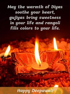 happy deepavali day with candles on the ground and texting that reads, may the warmth of diyas soothe your heart, gujyas bring sweetness in your life and