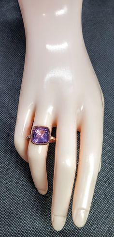 14K solid rose gold hammered ring with 0.15 ct. SI1, G color natural brilliant diamonds & 4.94 ct. 11x11 mm cushion shape AAA natural pink amethyst. This item can also be ordered in yellow or white gold with different color gemstones such as citrine, amethyst, green amethyst, pink amethyst, smoky quartz, London blue topz, Swiss blue topaz, white topaz, garnet, peridot, morganite & aquamarine, please contact me for a quote as each gemstone varies in price. I am a manufacturer of fine jewe Amethyst Diamond Ring In Rose Gold, Pink 14k Gold Amethyst Ring, Elegant Amethyst Crystal Ring With Multi-stone, 17th Wedding Anniversary, Elegant 14k Gold Multi-stone Amethyst Ring, Pink Multi-stone Amethyst Ring Gift, Purple Multi-stone Amethyst Crystal Ring, Hammered Ring, Hammered Rings