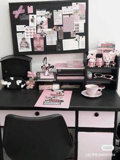 a black desk topped with pink and white items