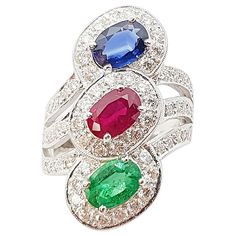 Ruby 1.13 carats, Blue Sapphire 0.90 carat, Emerald 0.63 carat and Diamond 1.25 carats Ring set in 18 Karat White Gold Settings Width: 1.2 cm Length: 2.7 cm Ring Size: 51 Total Weight: 9.44 grams "We first opened doors in 1980 when it was then situated in the vicinity of the Victory Monument; a small and modest storefront with a couple of counters. From its humble beginnings to where it stands today, our company has proven its abilities as a jeweler. Since the beginning, we have been supplying f Emerald And Diamond Ring, Diamond Ring Set, Emerald Diamond Ring, White Gold Set, Diamond Ring Settings, Emerald Diamond, Ring Set, Ring Sets, Jewellery And Watches