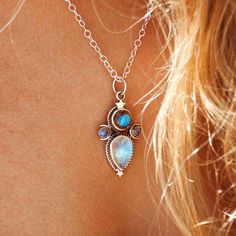 This mystical and celestial necklace will add a touch of magic to your look! Made with Labradorite and Moonstone gems, this sterling silver necklace features crescent moons and stars inspired by the cosmos. Labradorite can symbolize self-love, spiritual protection and intuition. As well, Moonstone can symbolize the divine feminine, clarity, intuition and the moon phases. Metal: Solid sterling silver Pendant size: 35mm Necklace length: 46cm plus 5cm extender chain Gemstone: Rainbow Moonstone and Labradorite Gemstone color: White Gemstones size: 12x8mm ✈  Free Shipping (USPS) 🎁  Free Gift Box ↻  60 Days Return ⌛  24 Handling Time  ** GET 15% OFF COUPON ** Visit 👉 boho-magic.com/join Join and get coupons, exclusive offers, updates, and more surprises! ** ALSO IN OUR SHOP ** Shop▸ https://et Moonstone Necklace Silver, The Moon Phases, Dark Things, Moons And Stars, Boho Jewels, Spiritual Necklace, The Divine Feminine, Celestial Necklace, Spiritual Protection