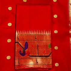 This exquisite regal paithani saree is handwoven in vermillion red color. Traditional gold zari coin buttis adorn the body while the golden zari border is decorated with handwoven brocade border. The elaborate pallu is woven with colorful peacocks along with winding vines and flowers. The saree comes with plain blouse with matching borders. Approximate Length 6.5 mtrs (inclusive of blouse length)Height - 48- 52" Approximate weight - 1.8 lbs Saree comes with fall and picot done. Blouse piece is cut. Kindly Note : The colors you see on your device may vary due to the color reproduction, brightness and resolution of individual devices. If you'd like more clarity before your purchase, please contact our support team. Paithani Silk Traditional Wear For Diwali, Traditional Gold Unstitched Saree, Paithani Silk Saree With Zari Work For Traditional Ceremonies, Festive Paithani Silk Traditional Wear, Gold Traditional Wear With Zari Weaving For Festivals, Navratri Paithani Silk Saree For Traditional Ceremonies, Festive Paithani Silk Saree For Puja, Red Paithani Silk Traditional Wear With Motifs, Transitional Paithani Silk Traditional Wear With Zari Weaving