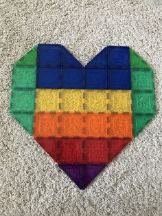 a heart made out of different colored blocks