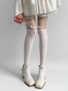 Get the perfect mix of elegance and playfulness with our fake two-piece tights featuring adorable bowknot details. Available in classic black or white, these tights are a versatile addition to your wardrobe.   Please note that this product includes only one pair of tights. Fitted White Balletcore Bottoms, Fitted Legwear With Bow For Party, Fitted Bow Stockings For Party, Fitted White Feminine Legwear, Fitted Feminine White Legwear, Elegant White Thigh-high Stockings, Elegant White Thigh High Stockings, Elegant White Fitted Tights, White Stretch Knee-high Socks For Party