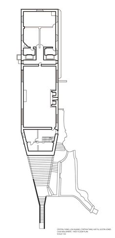 a drawing of a floor plan for a house with stairs and an elevator in the center