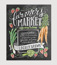 a chalkboard sign that says farmers market with carrots and celery on it