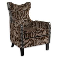 a brown and black chair with zebra print upholstered on the armrests