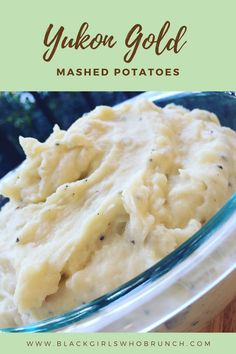 a bowl filled with mashed potatoes on top of a wooden table and text overlay that reads yukeon gold mashed potatoes