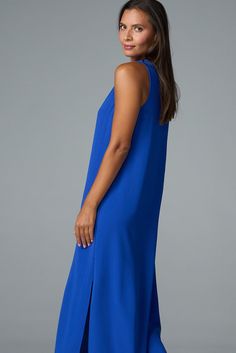 Our best-selling maxi dress is a summer staple. From weekend brunch to beach weddings, you'll wear this flowing style everywhere this season. ✓ All-Day Comfort ✓ Travel Friendly ✓ Day to Night ✓ Machine Washable DETAILS V neck Side slits FIT Regular fit True to size Model is 5'8" and wears size S MEASUREMENTS Length: 52" from shoulder (size S) FABRIC + CARE 100% polyester airflow Cold water wash on delicate. Line dry. Flowy V-neck Breezy Maxi Dress, Chic Summer Maxi V-neck Dress, Breezy V-neck Dress, Breezy V-neck Maxi Dress For Brunch, Flowy Midi Length V-neck Dress For Vacation, Elegant V-neck Maxi Dress For Vacation, Chic Solid Color Midi Beach Dress, Elegant Maxi Beach Dress For Vacation, Chic Floor-length Midi Dress For Beach Season