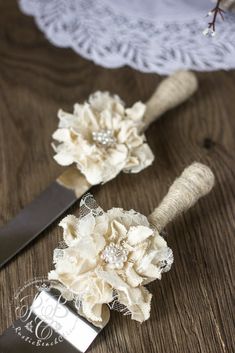 two wedding bouquets with lace and flowers on them