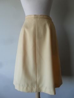 "1970s Lilli Ann Suit with classic 1970s details * Beautiful contrasting top stitching in brown at cuffs, collar, pockets and waist band * Fully lined skirt and jacket * Tucked front pockets * Two button front closure on jacket with button and zipper closure on skirt * Band at top of vent in back on jacket * Skirt, simple 4 gores into an A-line * Shown on 37-27-37 dress form ---------- Measurements are in inches and are approximate: ---------- Jacket ---------- Bust: 36-38 Waist: 30-32 Sleeve le Retro Fitted Skirt With Pockets, Retro Solid Color Skirt For Spring, Vintage Brown Skirt For Work, Vintage Brown Skirt For Workwear, 1970s Fitted Lined Skirt, Vintage Fitted Skirt With Pockets, Vintage Full Skirt For Workwear, Fitted Vintage Skirt With Pockets, Classic Skirt With Pockets For Daytime