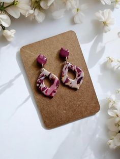 Marble Plum Red & Pink Earrings - Versatile & Chic! 💖✨ Elevate your style with our stunning Marble Plum Red & Pink Earrings! Available in a variety of styles and sizes, these earrings feature a beautiful marble effect in soft, blended shades of plum, red, and pink. Perfect for any occasion, they offer a bold yet elegant look that complements any outfit. 🌸 From subtle to statement, find the perfect pair to suit your style! 💫 --- These earrings are crafted from high-quality, lightweight polymer Wedding Jewelry Earrings, Pink Marble, Pink Earrings, Wedding Earrings, Earrings Jewelry, Handmade Earrings, Jewelry Gift, Perfect Pair, Halloween Shopping