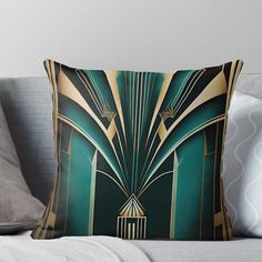 a green and gold art deco design throw pillow