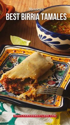 mexican burritos on a plate with a fork and bowl of salsa in the background