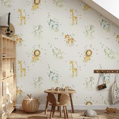 a child's room with a wallpapered animal theme and wooden chairs in front of the table