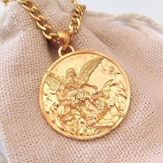 ★ St Micheal Archangel Pendant ★ Handcrafted St Micheal Archangel pendant/necklace for Men and Women. * Materials/Finishes ➤ Sterling Silver (Silver 925) ➤ 24K Gold Plated over Silver 925 ➤ 14K Rose Gold Plated over Silver 925 * Dimensions ➤ 3.4 x 3.0 x 0.4 cm (~ 1.3 x 1.2 x 0.2 inches)/Bail: Suitable for up to ~ 4.5 mm (~ 0.18 inches) Chain * Weight: ~ 15 grams (in Silver 925) ----------------------------------------------------------------------------- IMPORTANT NOTES: ------------------------ Arch Angel Michael, St Michael Pendant, Tanzanite Pendant, Nana Gifts, Precious Jewels, Blue Pendant, Grandma Gift, Necklace For Men, Sterling Silver Mens