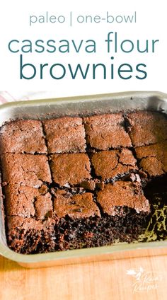 chocolate brownies in a pan on a wooden table with text overlay that reads pale one - bowl cassava flour brownies