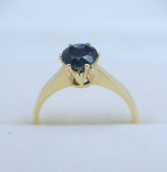 Absolutely Stunning Hand Made Classic Style Engagement Dress Ring. Made in Solid 14K Yellow Gold Set with With 1.4Carat Australia greenish blue sapphire Ring Size 7 US  or N1/2 (UK/AU)  Metal: 14k Solid Gold  (Marked, and Professionally Tested,Cleaned and Polished ) Weight;2.75Grams Stamped;585PJB Condition:Pre-Owned The ring in excellent condition  (any dark marks on the gold in the photos are only reflections) Ring Come with New  Luxury Wooden Box (different as in the photo). Classic Sapphire Birthstone Ring, Classic Sapphire Halo Ring, Classic Sapphire Birthstone Ring With Gemstone, Sapphire Ring With Brilliant Cut For Proposal, Classic Sapphire Ring With Lab-created Gemstone, Brilliant Cut Sapphire Ring For Proposal, Sapphire Ring For Proposal With Round Cut, Timeless Sapphire Ring With Round Band, Diamond Cut Round Sapphire Ring