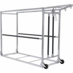 a large metal rack with two bars on wheels