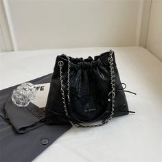 UAKISS - Small Bow Pu Leather Shoulder Bags for Women 2024 Summer Trend Designer Korean Fashion Handbags and Purses Chain Crossbody Bag SIZE: (Upper Width)22cm * (Lower Width)32cm * (Height)22cm * (Thickness)10cm Handle Height:31cm Shoulder Belt Length:44cm Woven Beach Bags, Silver Handbag, Leather Shoulder Bags, Shoulder Belt, Handbags And Purses, Belt Length, Floral Bags, Shoulder Bags For Women, Small Bows