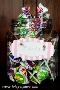 a glass jar filled with lots of candy