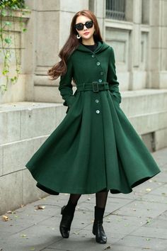 ★★ Welcome to my Ylistyle's shop！！！ This wool coat has a large hemline and can be turned up. The fabric is very soft and cozy, and the dark green color is more appropriate for fall and winter, very ambient. You can go wear it for any occasion. ★★ FEATURES 50% wool blend, 50% fiber, nylon Polyester lining Two side pockets Hooded coat Buttons closure Long sleeve wool coat Fit and flare coat Fabric Belt with belt loop Swing coat Regular fit Mid wool coat Perfect for winter, autumn ★★ The model's he Green Long Wool Coat For Winter, Green Long Wool Winter Coat, Green Wool Winter Coat, Hooded Wool Coat For Fall, Green Wool Coat For Winter, Green Fitted Wool Coat For Winter, Fitted Green Wool Coat For Winter, Green Single-breasted Wool Coat For Winter, Green Wool Sweater Coat For Winter