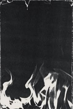 a black and white photo with flames on it