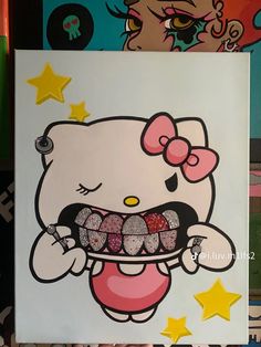 an image of a hello kitty painting on canvas