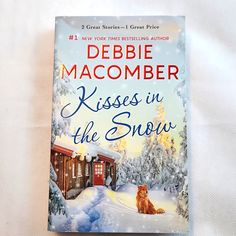 a book cover for kisses in the snow