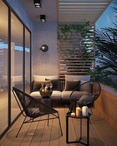 an outdoor living area with furniture and candles