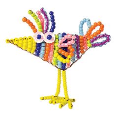 a colorful bird made out of beads on a white background