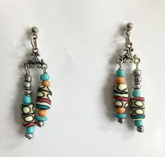 These have handmade beads with a definite southwestern look. They are lightweight to wear and have nice movement. They measure 1 3/4" long and 1/2"wide. Handmade Earrings Beaded, Handcrafted Artisan Jewelry, Southwestern Style, Handmade Beads, Artisan Jewelry, Beaded Earrings, Jewelry Watches, Jewelry Earrings, Things To Sell