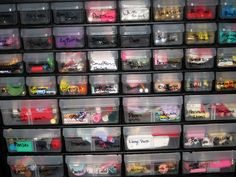 plastic storage containers filled with lots of different colored items