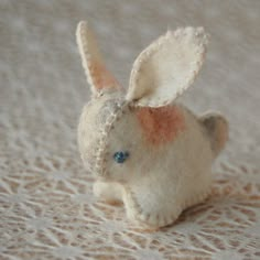 a small stuffed animal sitting on top of a table