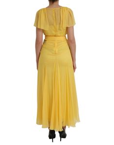 Dolce & Gabbana dresses are known for their elegant, sheer designs. This maxi dress features a zipper closure in the back and is made of 100% silk in a stunning yellow color. Made in Italy. Model: Maxi dress Color: Yellow Materials: 100% Silk Zipper closure Made in Italy Dolce Gabbana Belt, Sheer Maxi Dress, Dress Colour, Dolce Gabbana Dress, Yellow Silk, Colour Yellow, Dolce E Gabbana, Women Maxi, Dress With Cardigan