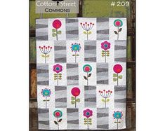 a quilt pattern with flowers on it and the words cotton street commonss written below