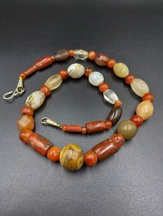 A beautiful old Ancient Antique Himalayan Indo Tibetan Necklace mala of carnelian Agate Sualamani , crystals beads The age of this beads are more than 1000 years old They were used in ancient times in prayers mala and in jewelry They were used as trade beads as well we provide fast and free shipping service world wide Antique Gemstone Beaded Necklace, Antique Gemstone Necklace With Round Beads, Traditional Agate Beaded Necklaces With Gemstones, Traditional Agate Beaded Necklace With Gemstones, Traditional Agate Gemstone Beaded Necklaces, Traditional Amber Gemstone Beaded Necklace, Traditional Carnelian Oval Bead Necklaces, Antique Agate Beaded Necklaces With Natural Stones, Traditional Carnelian Gemstone Necklaces