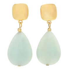 Kenneth Jay Lane has adorned these earrings with genuine amazonite gemstones known for their captivating blue-green hues and natural patterns. Each amazonite teardrop is carefully selected for its unique beauty and polished to perfection, creating a stunning contrast against the gold-plated setting. The graceful teardrop silhouette and 1.75" length elongates the neck and draws attention to your face. The pair is a flattering choice for all face shapes. Elegant Faceted Teardrop Earrings, Gold-tone Teardrop Pierced Earrings, Elegant Gold-tone Teardrop Earrings, Turquoise Teardrop Amazonite Jewelry, Elegant Amazonite Dangle Jewelry, Dangle Earrings With Amazonite And Natural Stones, Teardrop Jade Earrings With Natural Stones, Tarnish Resistant Gold-tone Teardrop Earrings, Expensive Diamond