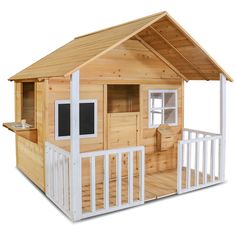 a child's wooden play house with porch and stairs on the side, in front of a white background