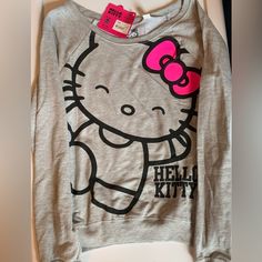 Nwt Hello Kitty Long-Sleeve Shirt- Sz M Oversized Neckline For The Off Shoulder Look. Smoke Free Home. Hello Kitty Long Sleeve Cotton Top, Hello Kitty Graphic Crew Neck Top, Casual Long Sleeve Hello Kitty T-shirt, Casual Hello Kitty Crew Neck T-shirt, Casual Cotton Hello Kitty T-shirt, Sleeve Shirt, Off Shoulder, Long Sleeve Shirts, Hello Kitty