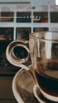 a cup of coffee sitting on top of a saucer