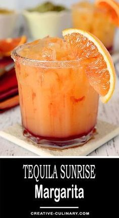 tequila sunrise margarita with orange garnish on the rim