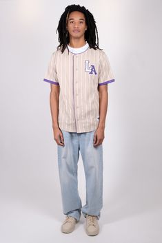 The LA Pinstripe Baseball Jersey is one of our new favorites. With its short sleeve and baseball body, the relaxed fit jersey features button up detail and LA patches on the front, plus a curved back hem. Just add your favorite thrifted chinos or cut off denim shorts Style: BTMH163S Denim Shorts Style, Shorts Style, Curved Back, Baseball Jersey, Baseball Jerseys, Baseball Tee, Shoulder Sleeve, Cut Off, Brooklyn