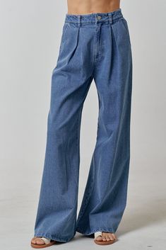 Introducing the Denim Palazzo Pant – a fun twist for those who adore the sophistication of trousers but can't resist the allure of denim. It's the best of both worlds, making it a must-have for your wardrobe. Whether you're tackling weekend errands paired with a boatneck long sleeve shirt or opting for a classic dressed-up feel with the classic Ivy shirt, these pants effortlessly blend comfort and style. The Fit: Slim at the waist, baggy pleated leg, & full length 🌟 Size Guide:- Small: 0-2- Medium: 4-6- Large: 8-10If you find yourself in between sizes, we recommend sizing up, as the fabric boasts the classic denim charm without the stretch. Don't miss out on the perfect balance of comfort and trend – grab the Denim Palazzo Pant and make a statement with your style! Material: 100% cotton Denim Palazzo, Denim Street Style, Eclectic Clothing, Palazzo Pant, Perfect Denim, Wide Jeans, 90s Style, Denim Trousers, Trendy Accessories